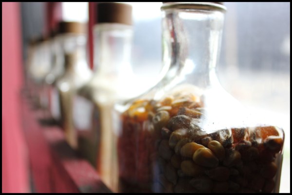 Here is a bottle full of corn.